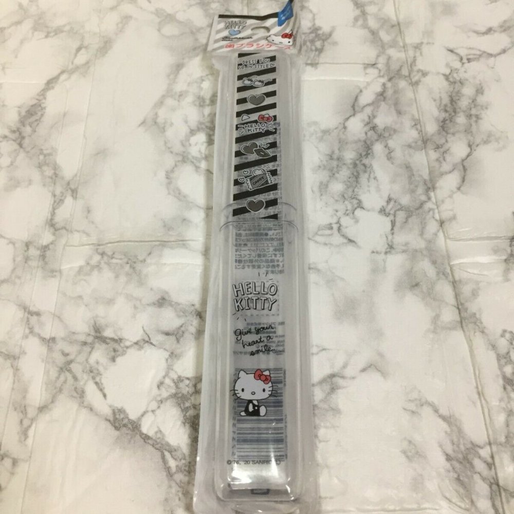 TWO(2) HELLO KITTY CLEAR PLASTIC TOOTHBRUSH HOLDERS